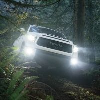 front view of a Toyota truck off-roading
