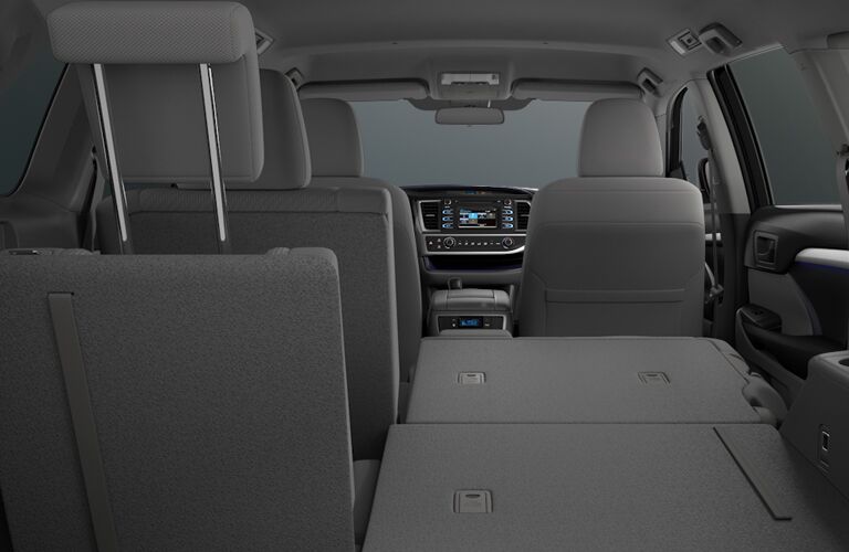 Rear seats of the 2018 Toyota Highlander folded flat for passenger and cargo versatility