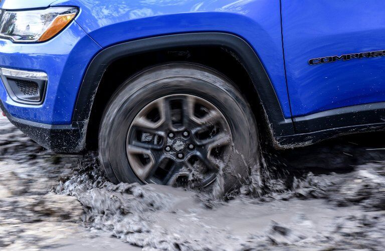 wheel close-up on the 2017 Jeep Compass while water fording