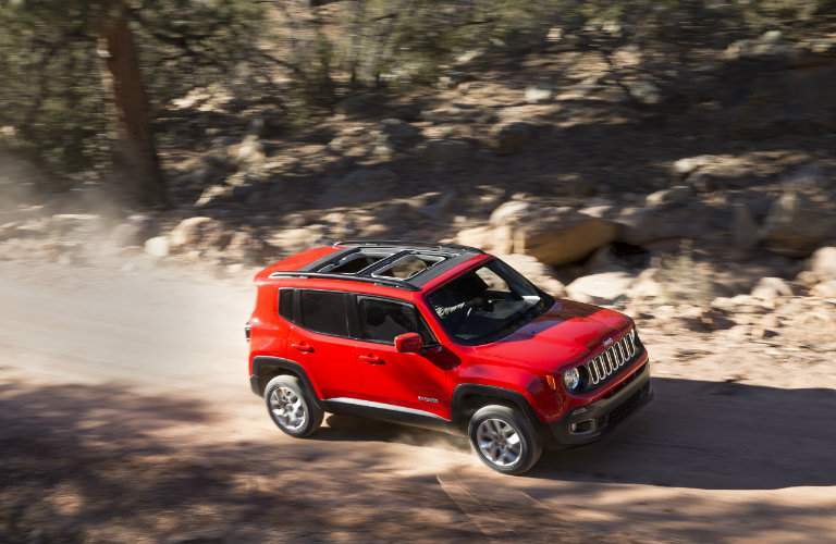 red 2018 Jeep Renegade in scrub forest
