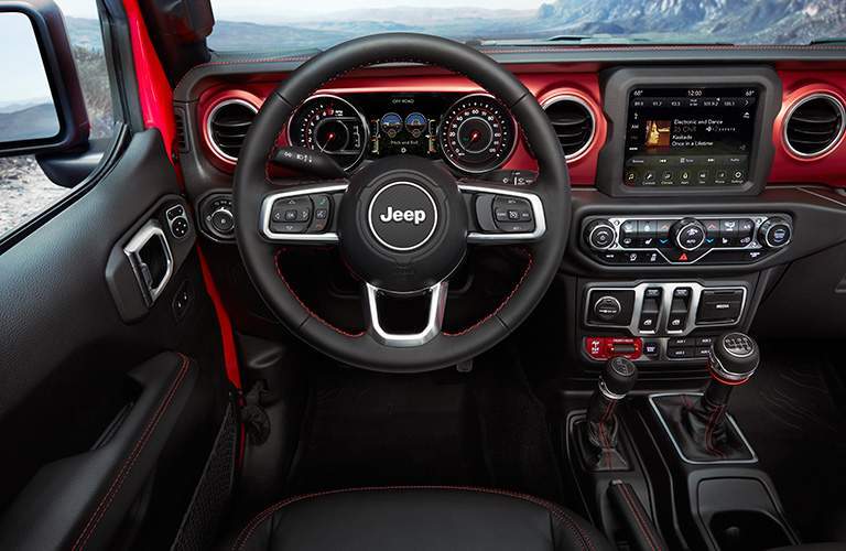 red-accented dashboard of the all-new 2018 Jeep Wrangler