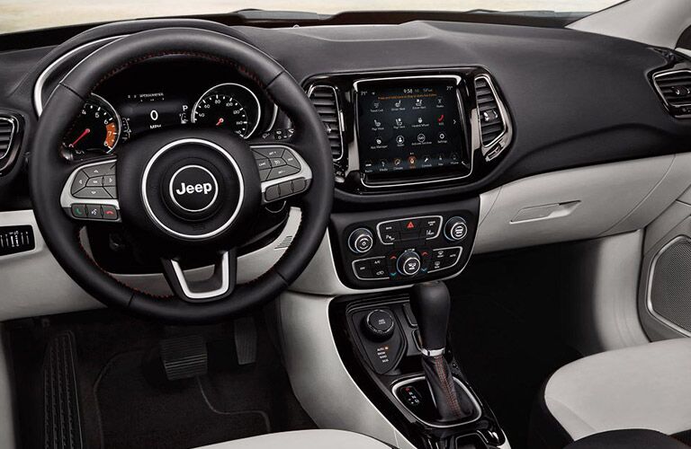 steering wheel and infotainment system of the 2019 Jeep Compass