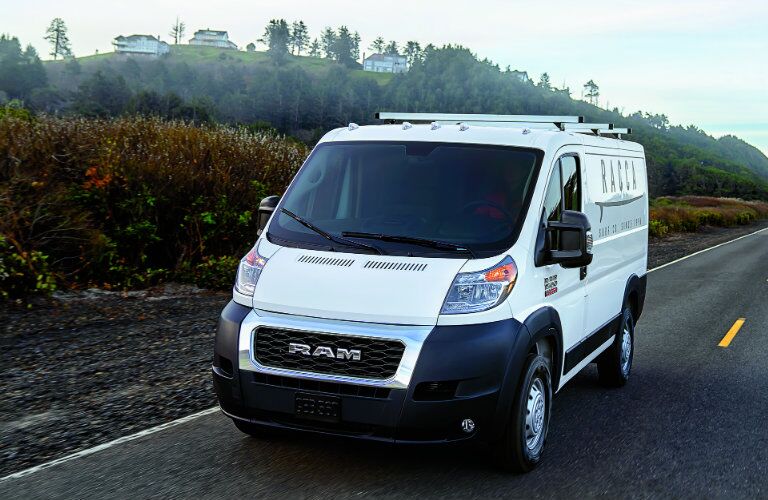 front of the 2019 Ram ProMaster Cargo Van driving on the road