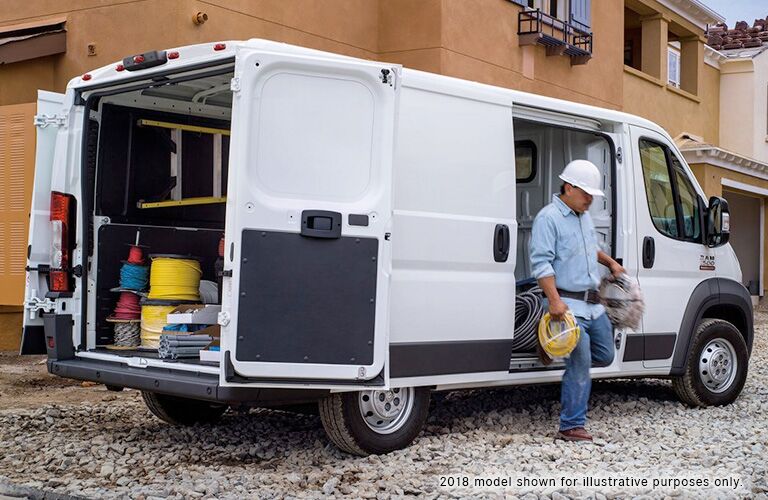 side of the 2019 Ram ProMaster Cargo Van loaded with gear