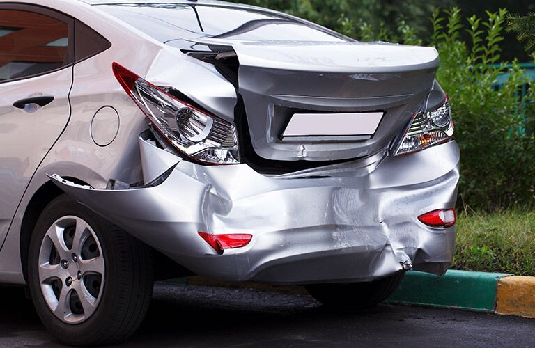 Fury Motors Lake Elmo Collision Center can repair even structural damage like this trunk