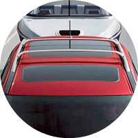 top of red 2017 Nissan Pathfinder as it tows boat