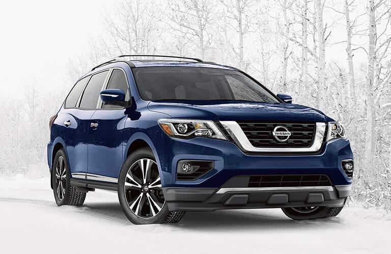 blue 2017 Nissan Pathfinder parked in snow