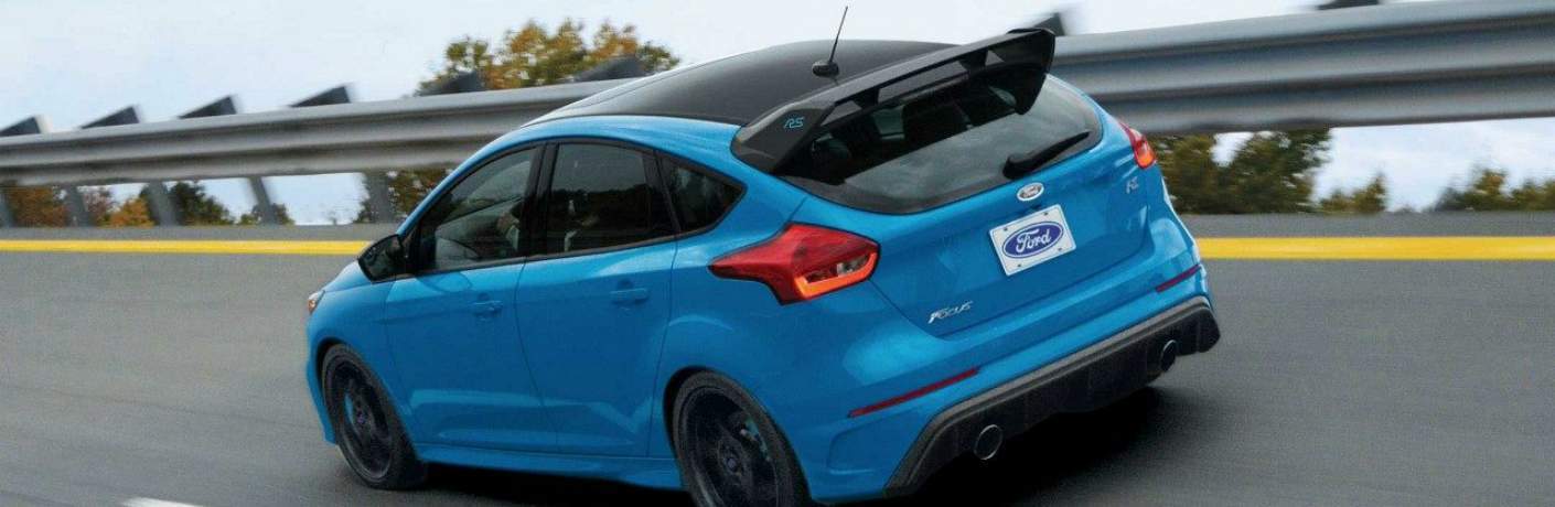 2018 Ford Focus RS Rear View with Spoiler Driving Through a Curve