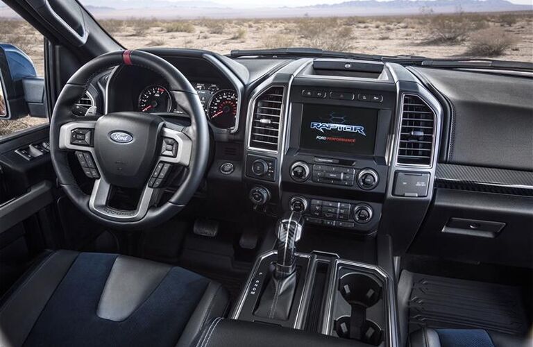 Front steering wheel and touchscreen of 2019 Ford F-150 Raptor