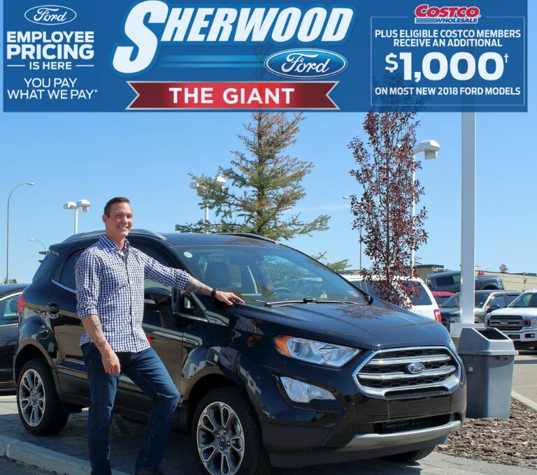 Scott from Sherwood Ford standing in front of 2018 Ford EcoSport