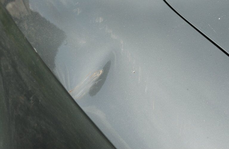 Damage Protection dent in car wing