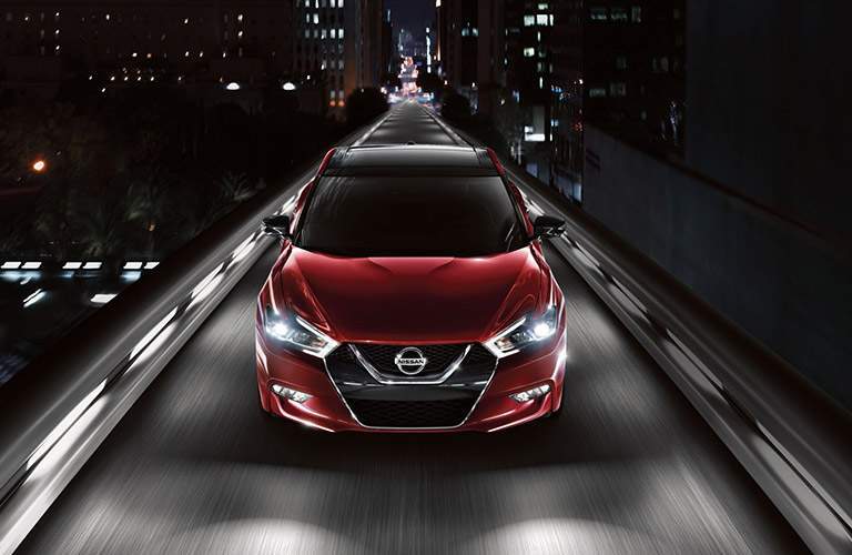 2018 Nissan Maxima Front View of Red Exterior with Dark Background