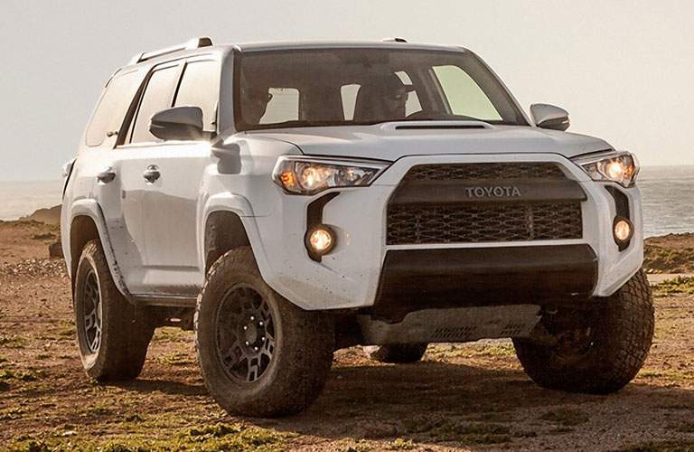 white toyota 4runner in desert