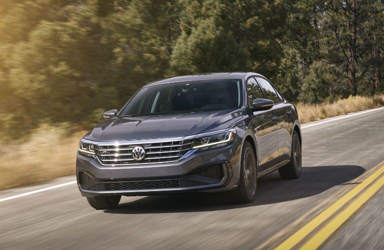 A head-on photo of the 2020 VW Passat on the road.