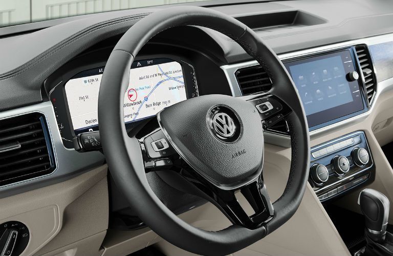 A photo of the steering wheel and digital gauge cluster in the 2020 VW Atlas.