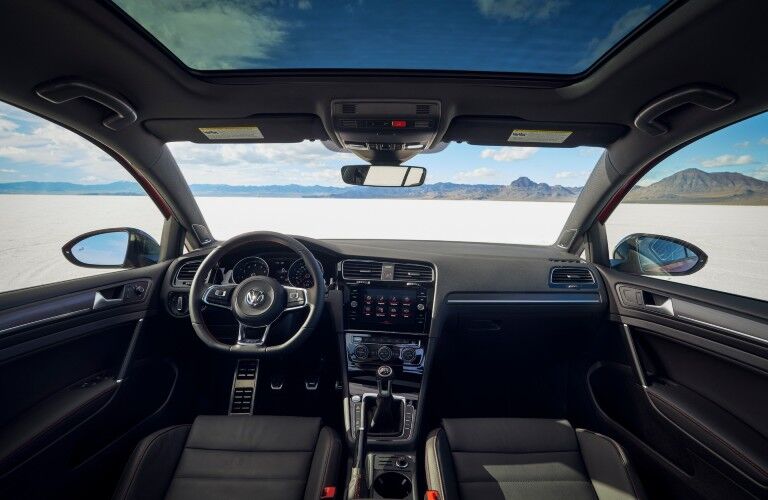 A photo of the driver's cockpit and dashboard in the 2021 VW Golf GTI.