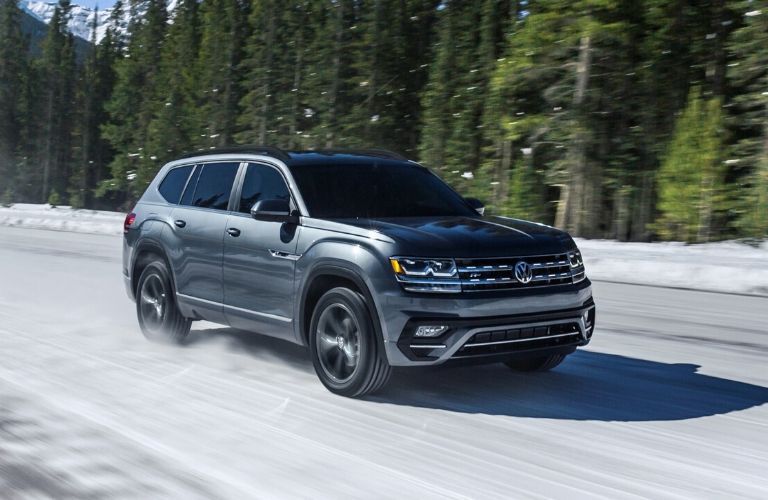 A front right profile of the 2020 VW Atlas on the road.