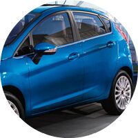 blue 2016 Ford Fiesta hatch exterior side
