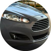 gray 2016 Ford Fiesta front grille and headlight