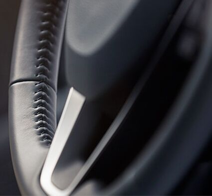 Available leather-wrapped steering wheel