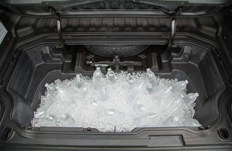 A storage compartment in the cargo bed can also be a cooler