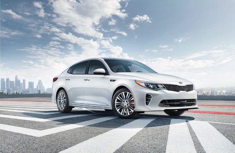 2018 Kia Optima parked with skyline background