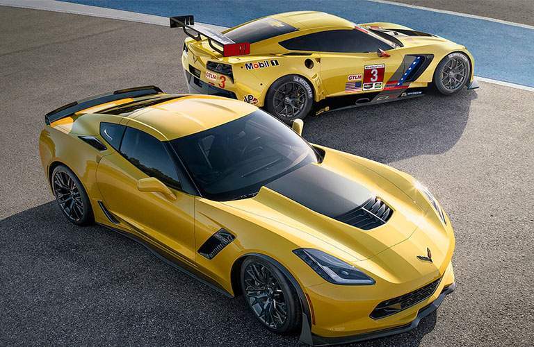 Two 2018 Chevy Corvette Z06 cars parked on racetrack