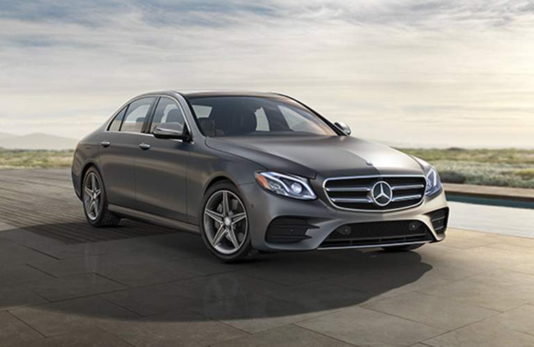 side view of a 2018 Mercedes-Benz E-Class sedan dramatically parked