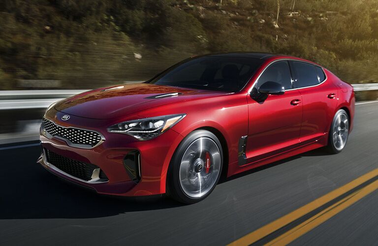 side view of a red 2018 Kia Stinger