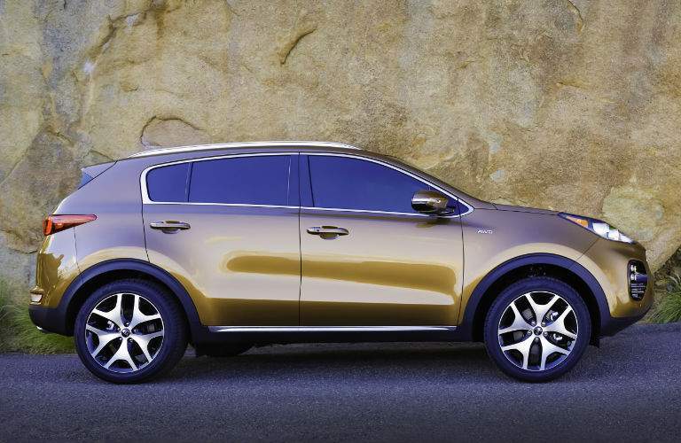 side view of a brown 2018 Kia Sportage