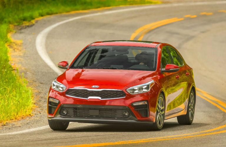 A head-on photo of the 2020 Kia Forte on the road.