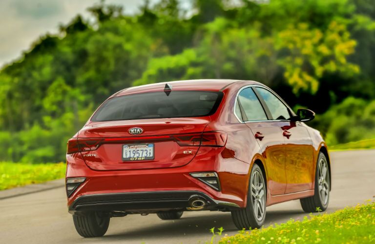 A rear photo of the 2020 Kia Forte on the road.