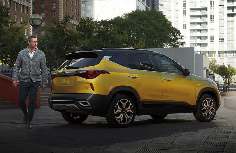 A photo of the 2021 Seltos parked on a street.