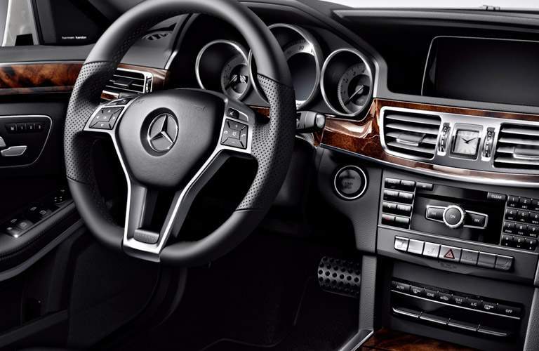 2018 Mercedes-Benz E-Class Wagon interior streering wheel and dashboard angled