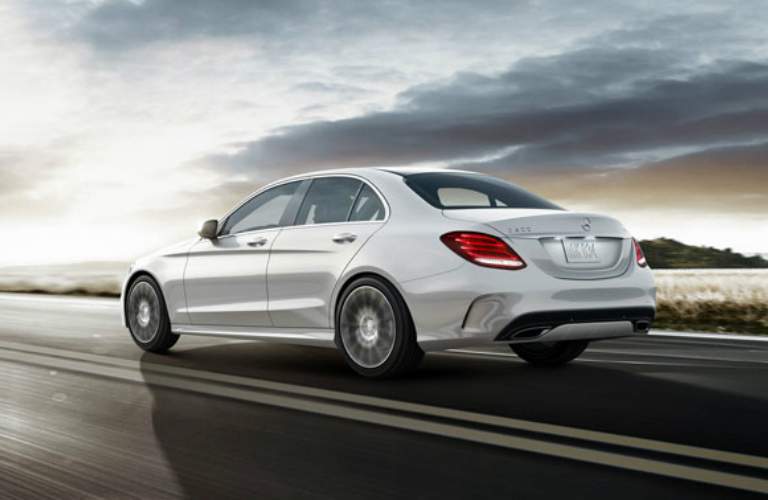 2018 Mercedes Benz C Cl Vs 2017 White 2018 Mercedes Benz C Cl Driving On Open Road