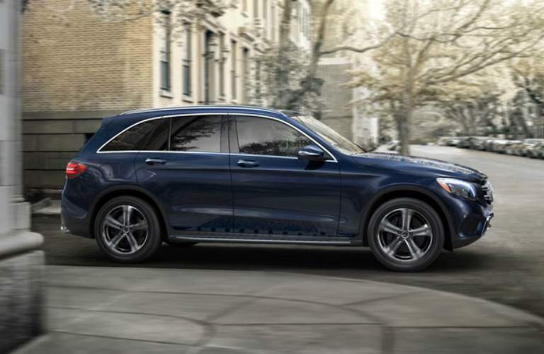 blue 2018 Mercedes-Benz GLC driving on city streets