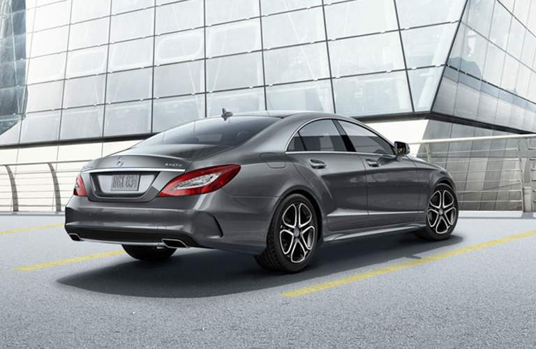 2018 Mercedes-Benz CLS Coupe exterior rear shot parked in a parking lot in front of a skyscraper