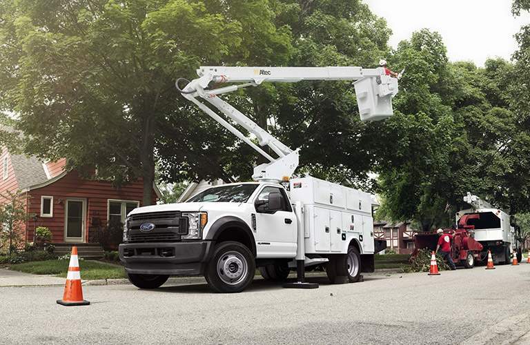 2017 Ford Super Duty Chassis Cab working on power lines