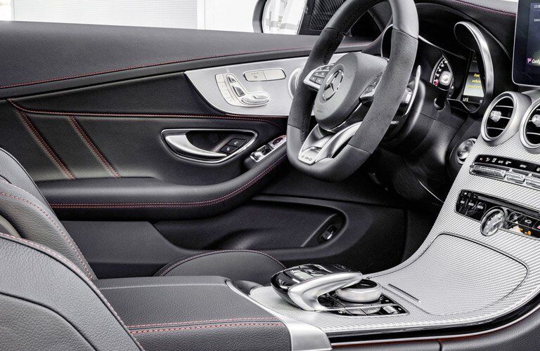View of the 2017 Mercedes-Benz C-Class' steering wheel from the passenger's side