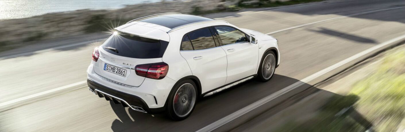 White 2018 Mercedes-Benz GLA driving cliffside