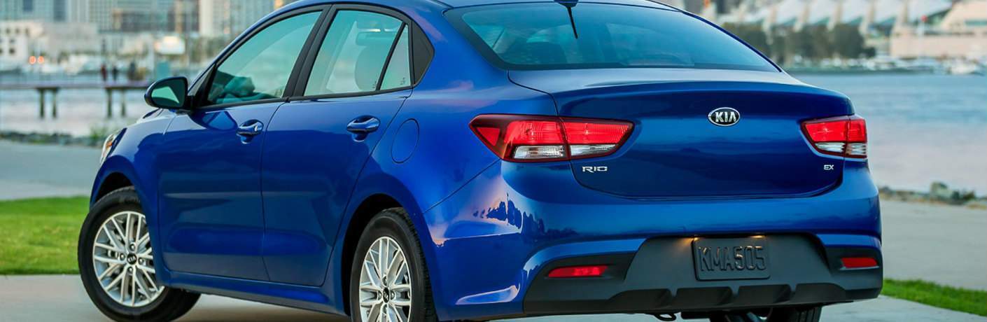 Rear view look at a blue 2018 Kia Rio EX