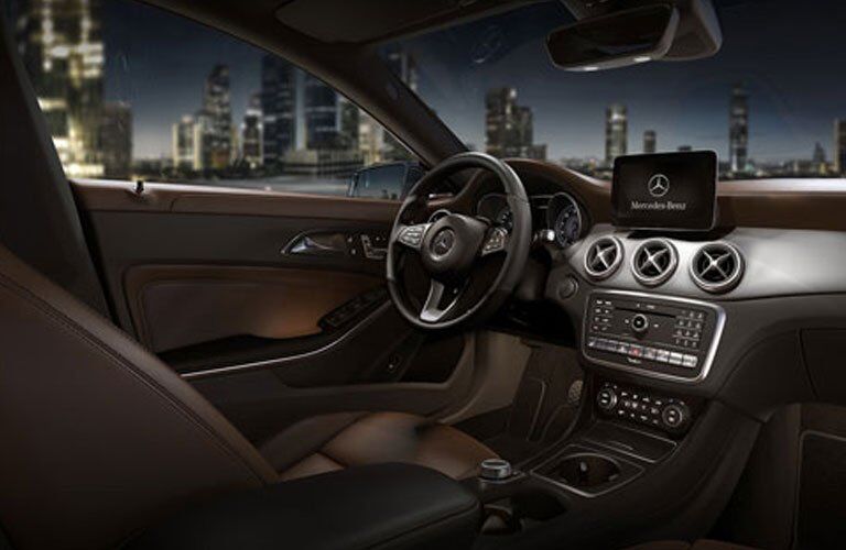 brown interior, driver cockpit, of the 2018 Mercedes-Benz CLA