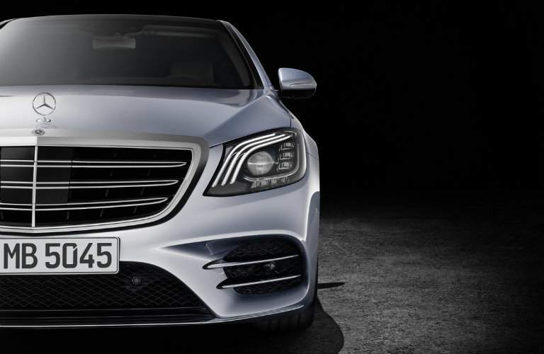 front grille close-up of the 2018 Mercedes-Benz S-Class on a black background