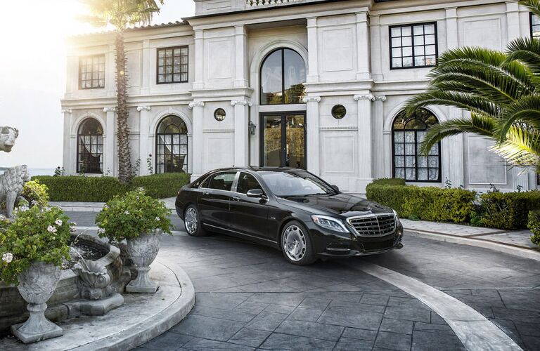 2017 Mercedes-Benz S-Class parked before an elegant mansion