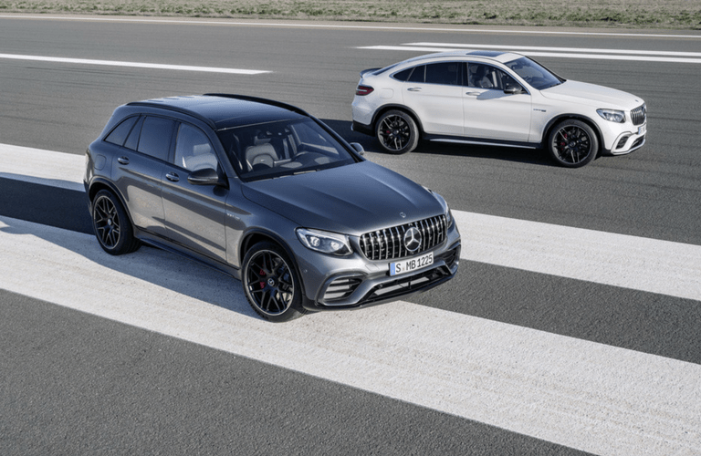 2018 Mercedes-AMG GLC 63 SUV exterior front two models