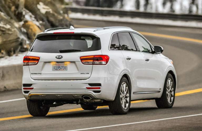 2018 Kia Sorento exterior back shot driving on snowy road