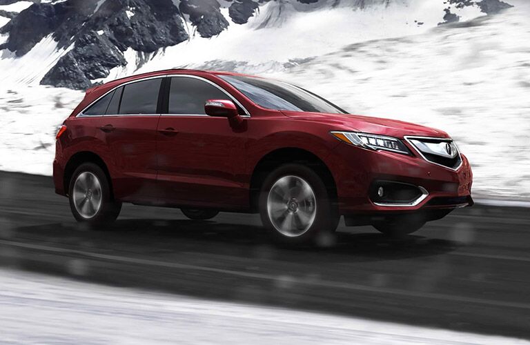 red 2017 acura rdx by snow