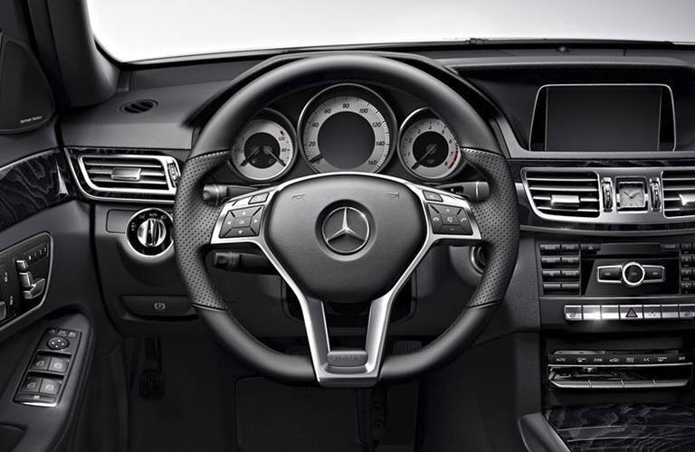 Steering wheel and dashboard view of the 2016 Mercedes-Benz E-Class
