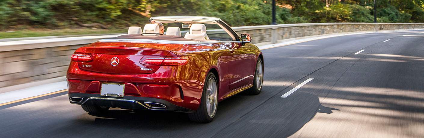 rear view of the 2018 Mercedes-Benz E-Class Cabriolet driving down the road