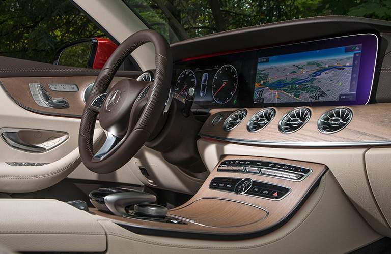 side view of the dashboard and steering wheel in the v2018 Mercedes-Benz E-Class Cabriolet 
